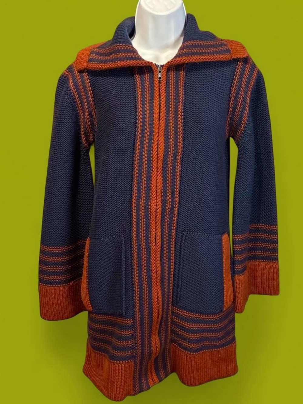 Vintage 1970s long blue-and-orange knit zip-up sweater.